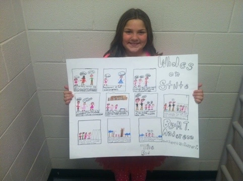 A girl floor holding a comic strip reserve how as to example of creative book report ideas